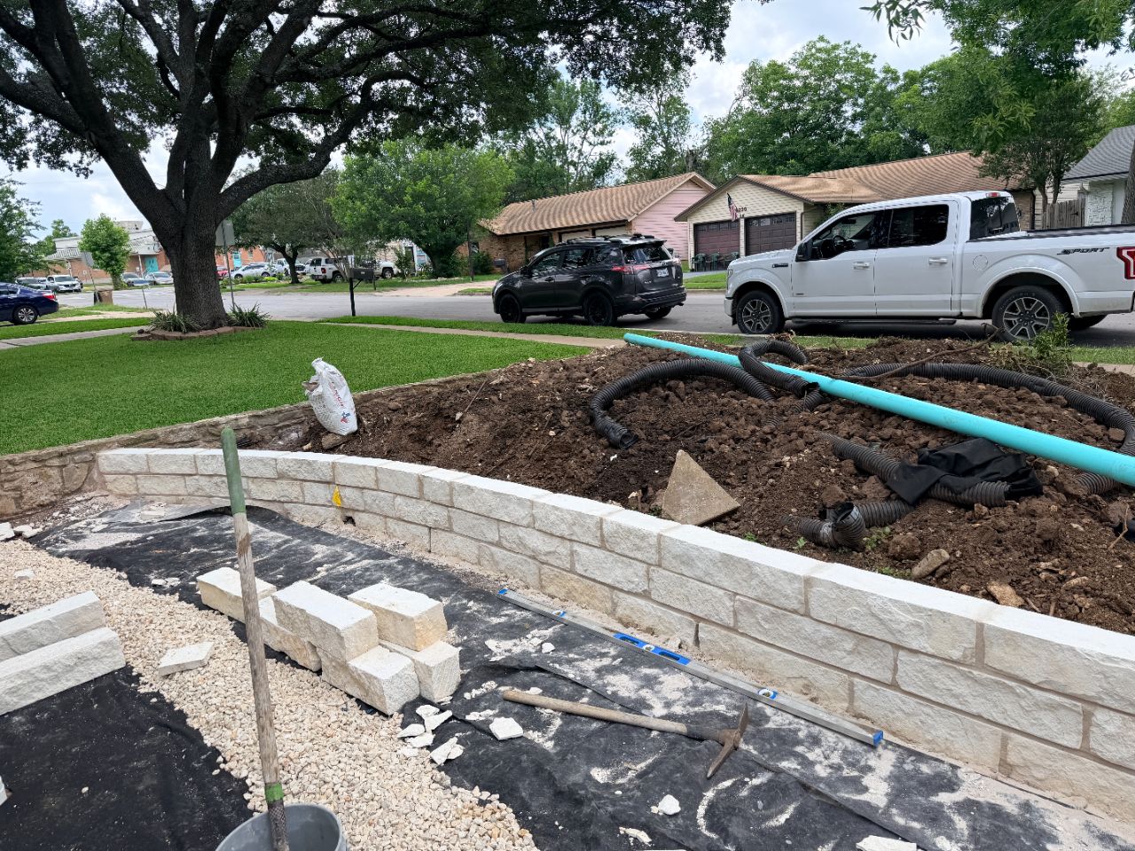 Stone hardscape and retaining wall by Corral Bros in Central Texas