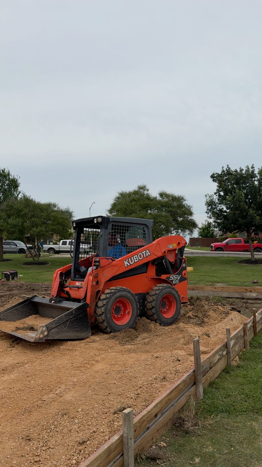Kubota skid steer during land prep on an Austin, TX property