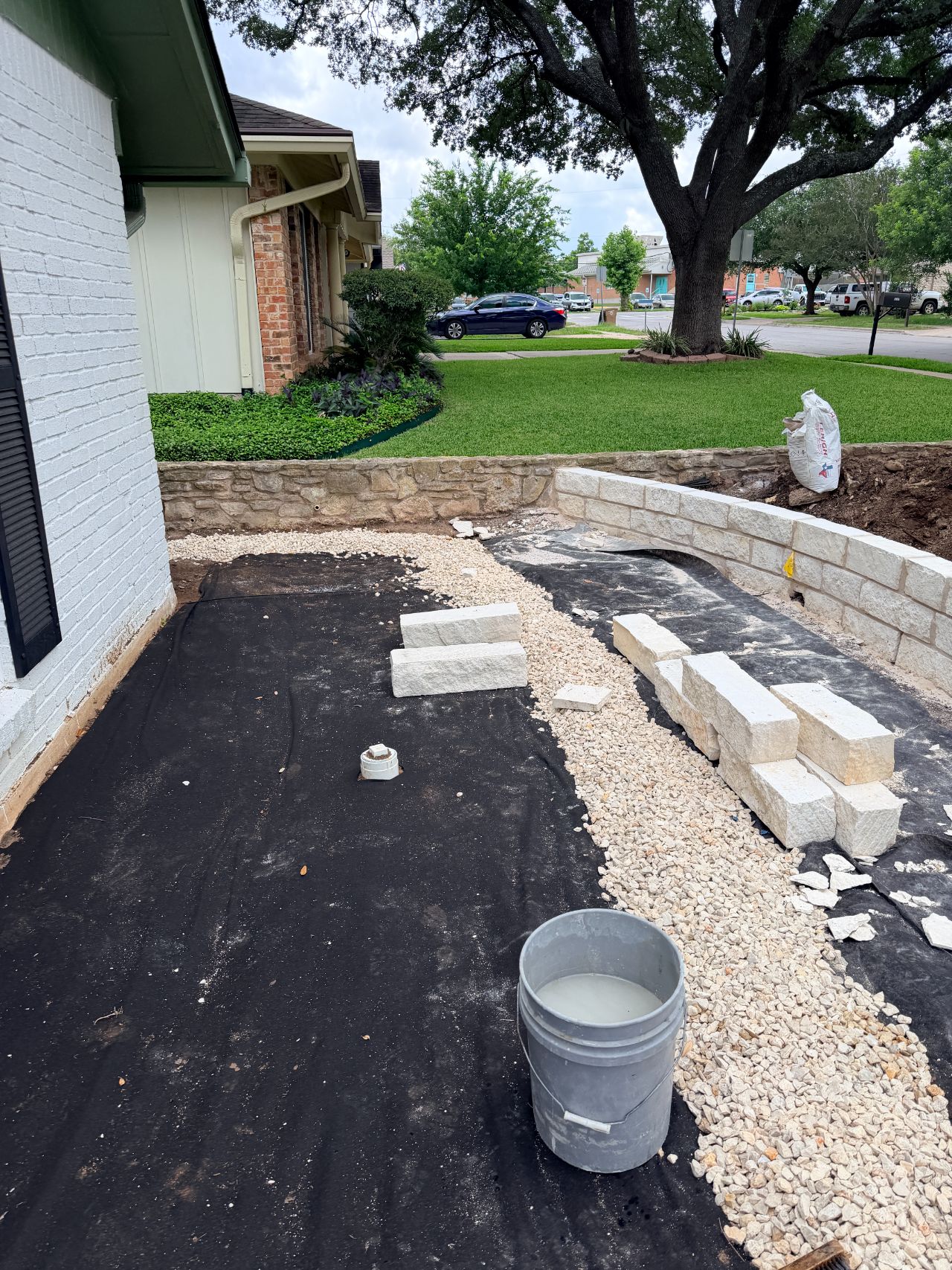 Limestone retaining wall installation in Cedar Park, TX