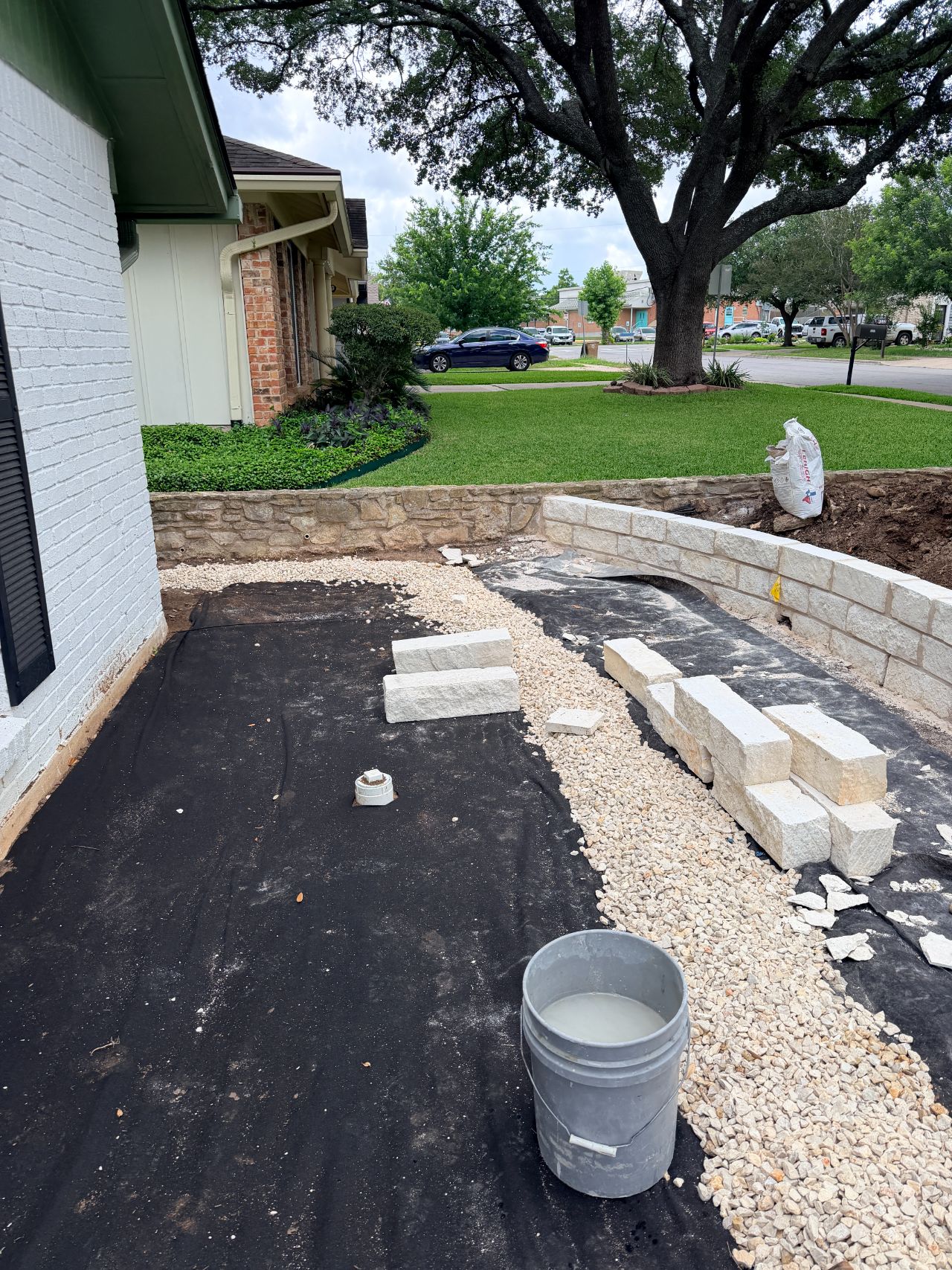 New limestone retaining wall build on a Central Texas property