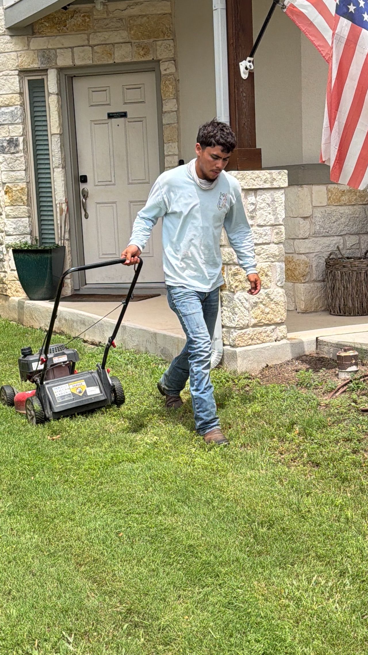 Residential lawn mowing service by Corral Bros in Austin, TX